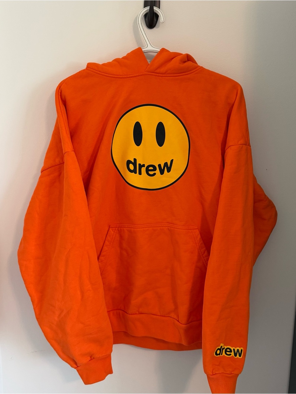 drew House Orange Crewneck Hoodie with Yellow Smiley Logo